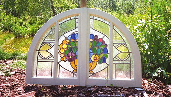 Rundbogenfenster mit Tiffany Kunstverglasung mit Blumenmotiv Design by Claudia Kroker